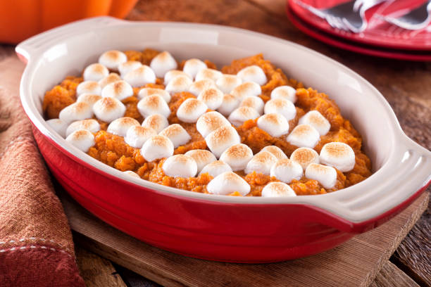 sweet potato casserole - candied yams stock pictures, royalty-free photos & images