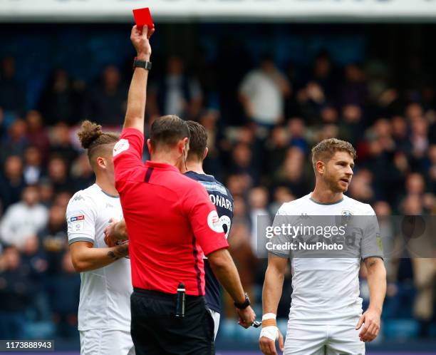 Gaetano Berardi of Leeds United gets red card from Referee during English Sky Bet Championship between Millwall and Leeds United at The Den , London,...