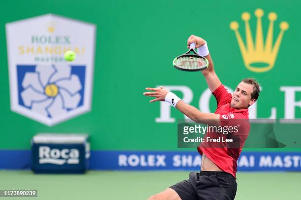 Vasek Pospisil of Canada in action against Marcel Granollers of Spain during 2019 Rolex Shanghai Masters on Day 2 at Qi Zhong Tennis Centre on...
