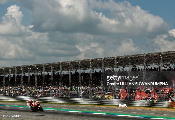 Repsol Honda Team Spanish rider Marc Marquez rides during the MotoGP race for the Thailand Grand Prix at Buriram International Circuit in Buriram on...
