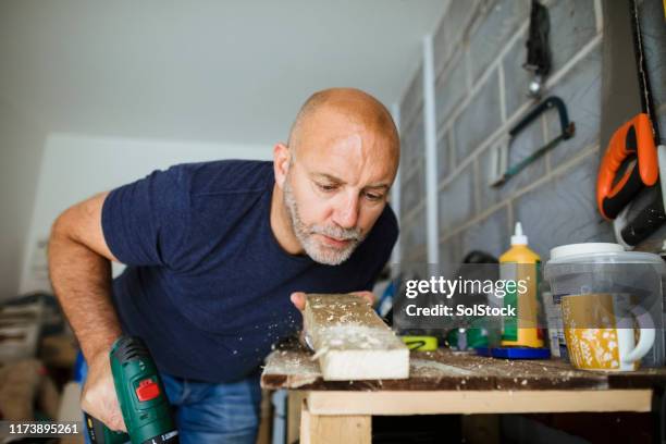 completing diy task - sawdust stock pictures, royalty-free photos & images