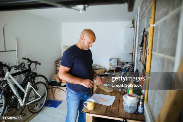 carpenter brainstorming - workbench stock pictures, royalty-free photos & images