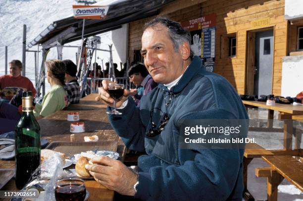 Pascal Couchepin with a glass of red wine