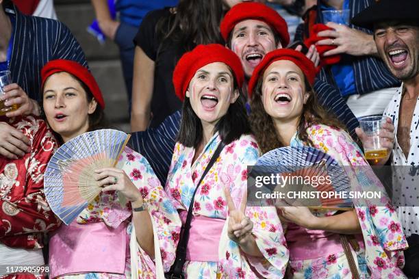 France's supporters react during the Japan 2019 Rugby World Cup Pool C match between France and Tonga at the Kumamoto Stadium in Kumamoto on October...