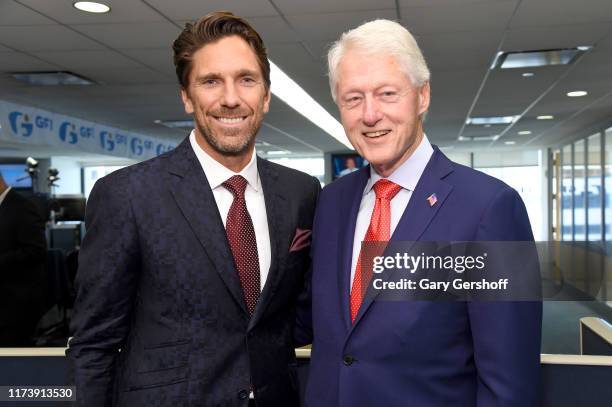 Bill Clinton and Henrik Lundqvist attend Annual Charity Day Hosted By Cantor Fitzgerald, BGC and GFI on September 11, 2019 in New York City.