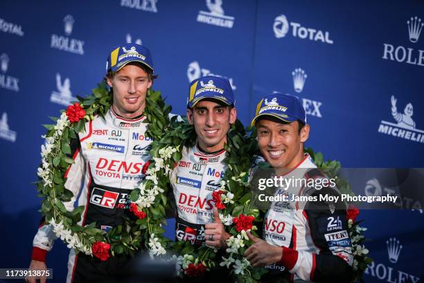 Race winners Brendon Hartley of New Zealand and Toyota Gazoo Racing; Sebastien Buemi of Switzerland and Toyota Gazoo Racing; and Kazuki Nakajima of...