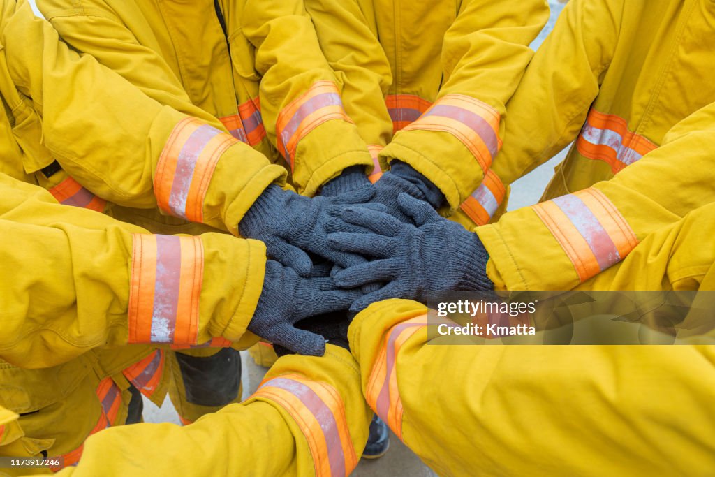 Firefighters Teamwork High-Res Stock Photo - Getty Images