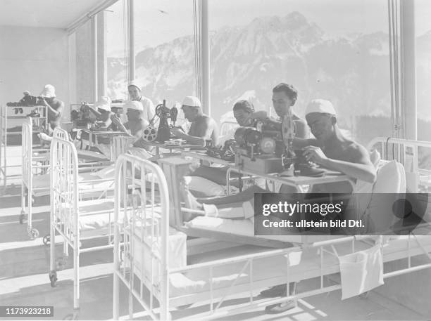 Patients in a sanatorium sawing shoes, ca. 1935 Leysin: patients in a sanatorium sawing shoes, ca. 1935 Leysin: patients in a sanatorium sawing...