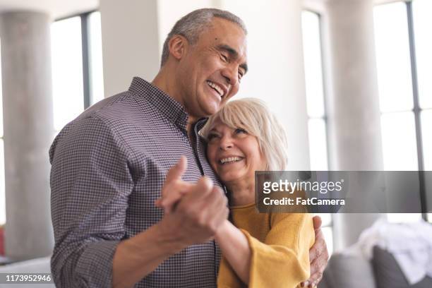 active senior couple dancing - baby boomer stock pictures, royalty-free photos & images