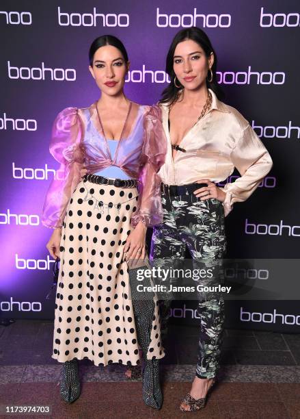 Jessica Origliasso and Lisa Origliasso attend the boohoo x Nasty Gal x boohooMAN Housewarming Party on September 11, 2019 in Sydney, Australia.