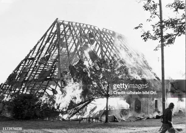 Muhen, thatched house burnt down completely, 1961