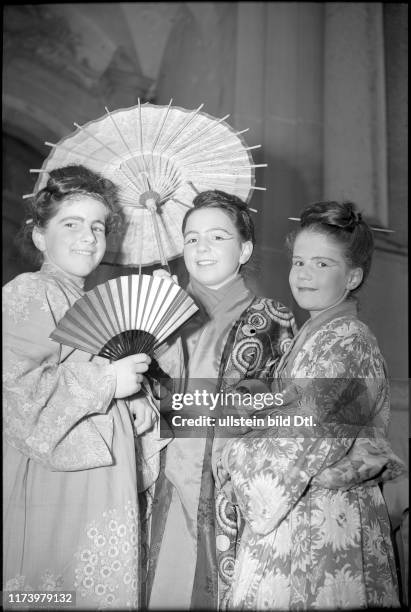 Girls dressed in Japanese style at carnival festivities in Schwyz in 1947