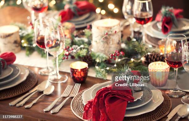 christmas holiday dining - dining table stock pictures, royalty-free photos & images
