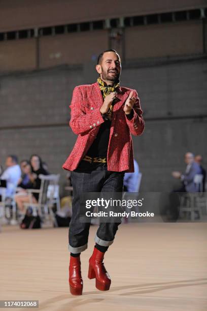 Designer Marc Jacobs greets everyone from the runway after his Marc Jacobs Spring 2020 Runway Show at Park Avenue Armory on September 11, 2019 in New...