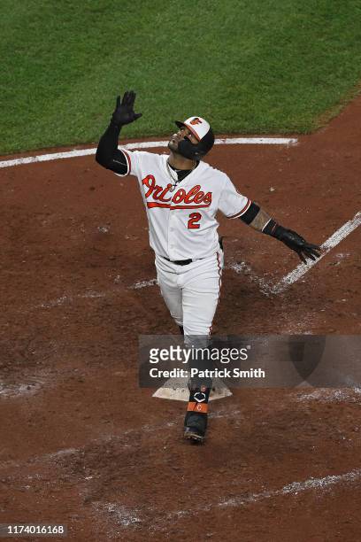 Jonathan Villar of the Baltimore Orioles celebrates after hitting a three run home run against the Los Angeles Dodgers during the seventh inning at...