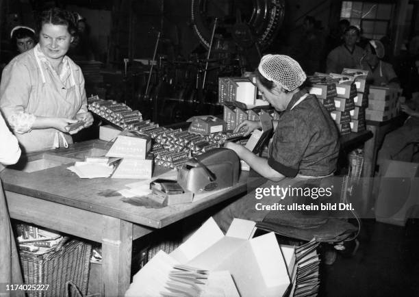 Factory workers packing Toblerone chocolate, around 1950