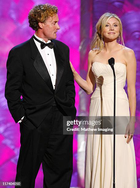 John C. McGinley and Sarah Chalke, presenters during 58th Annual Creative Arts Emmy Awards - Show at The Shrine Auditorium in Los Angeles,...