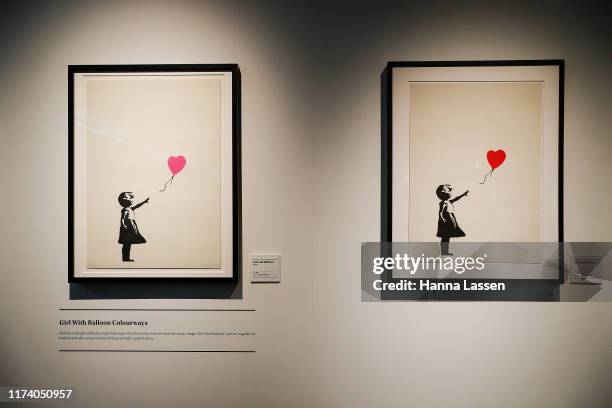 The artworks entitled Girl and Balloon are seen during a media preview for The Art of Banksy on September 12, 2019 in Sydney, Australia.