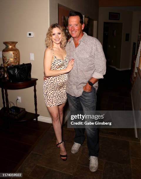 Nail artist Alexia Metropulos and hypnotist Anthony Cools attend a viewing party hosted by Gentille Chhun at her home during the season finale of the...