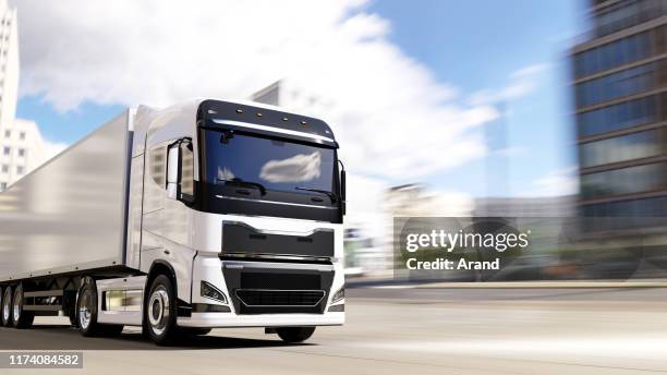 semi-truck with trailer driving on a city road - white truck stock pictures, royalty-free photos & images