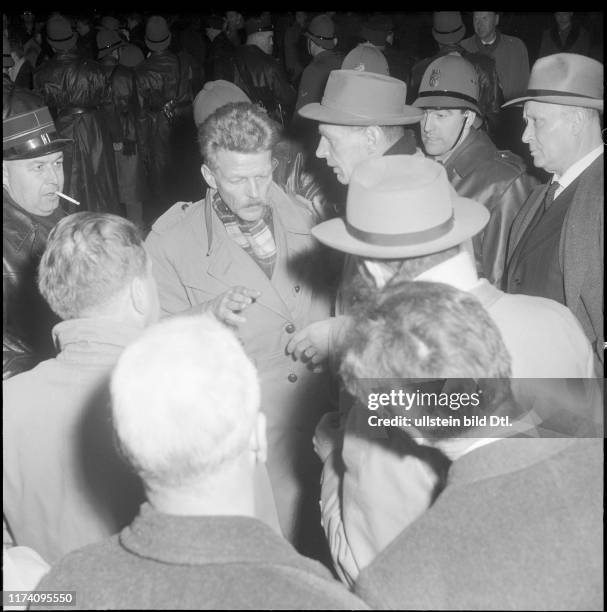 Demonstraters hinder invited guests; Armand Forel, police protection; 1961