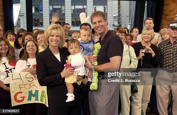 Joan Lunden and Jeff Konigsberg with their children Kate and Max Konigsberg on the Good Morning America set