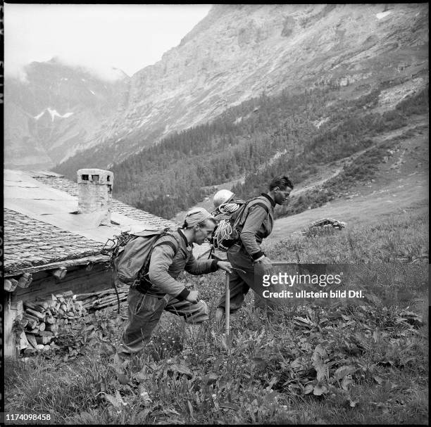 Adolf Derungs and Lukas Albrecht on the way to the Eiger North Face, 1959