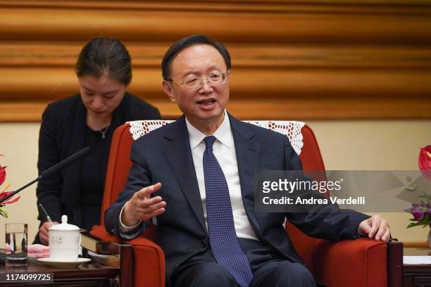 Member of the Politburo of the Communist Party of China Yang Jiechi speaks with Malaysian Foreign Minister Dato’ Saifuddin Abdullah during the...