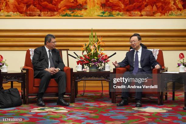 Member of the Politburo of the Communist Party of China Yang Jiechi speaks with Malaysian Foreign Minister Dato’ Saifuddin Abdullah during the...