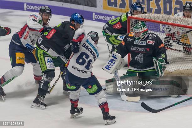 James Sheppard of Eisbaeren Berlin, Henry Haase of Augsburger Panther, Sean Backman of Eisbaeren Berlin, Patrick McNeill of Augsburger Panther and...