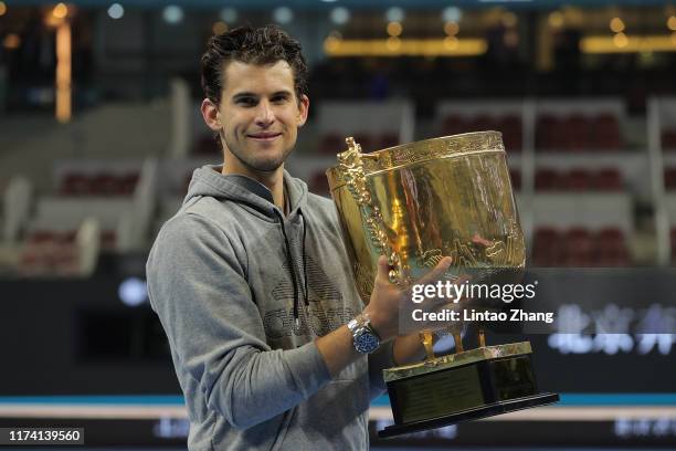 Dominic Thiem of Austria poses with the trophy during the medal ceremony after the Men's Singles final match against Stefanos Tsitsipas of Greece on...