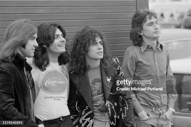 English glam rock group T Rex posed together at the Weeley Festival near Clacton-on-Sea, Essex on 28th August 1971. The band members are, from left...