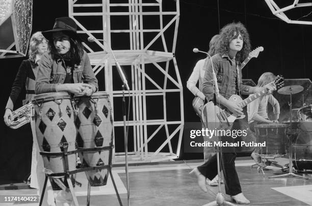 English glam rock group T Rex performing on the BBC music television show 'Top of the Pops', in London on 4th August 1971. Band members are, from...