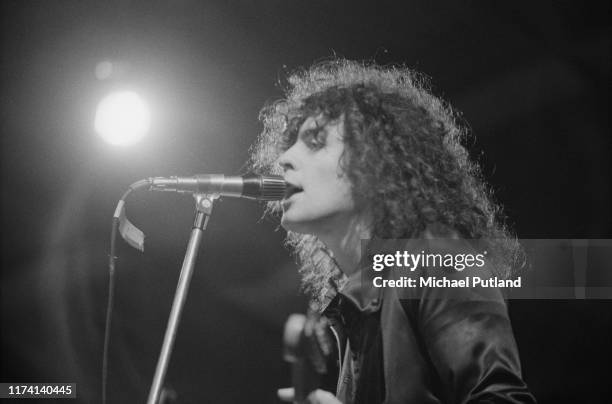 Singer and guitarist Marc Bolan of English glam rock group T Rex performs live on stage at the Weeley Festival near Clacton-on-Sea, Essex on 28th...