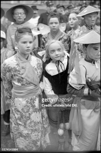 Girls dressed in Japanese style at carnival festivities in Schwyz in 1947