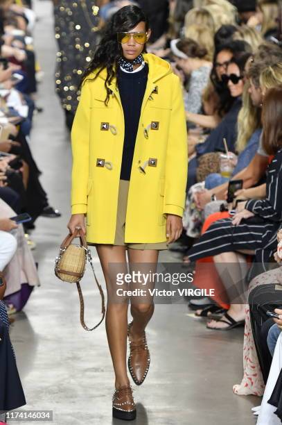 Model walks the runway at the Michael Kors Ready to Wear Spring/Summer 2020 fashion show during New York Fashion Week on September 11, 2019 in New...