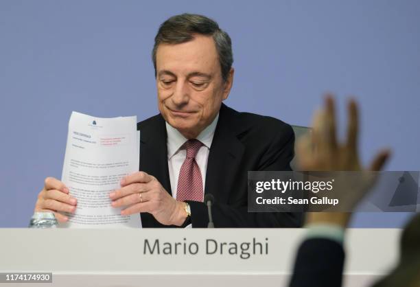 Mario Draghi, President of the European Central Bank, prepares to answer a reporter's question following a meeting of the ECB governing board on...