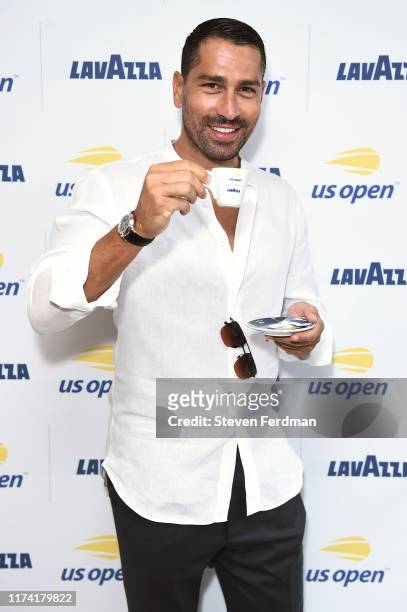 Marco Borriello enjoys coffee in the Lavazza Lounge during the 2019 US Open at Arthur Ashe Stadium on September 08, 2019 in New York City.