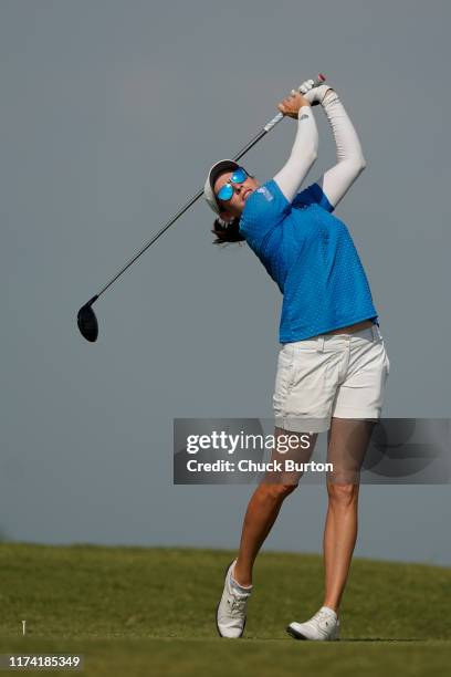 Katherine Perry tees off on the second hole during the final round of the Volunteers of America Classic golf tournament at the Old American Golf Club...