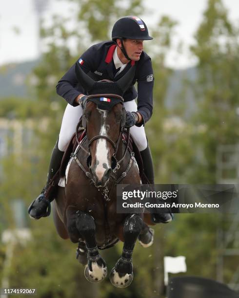 Kevin Staut of France rides Urhelia Lutterbach in the final competition during Day 4 of Longines FEI Jumping Nations Cup Final at Real Club de Polo...