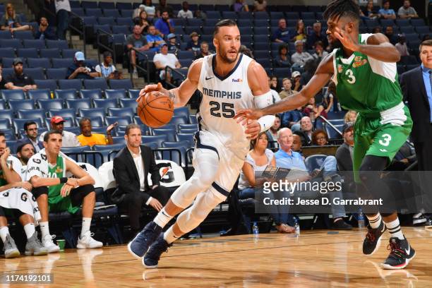 Miles Plumlee of the Memphis Grizzlies drives to the basket against the Maccabi Haifa during the preseason on October 6, 2019 at FedExForum in...