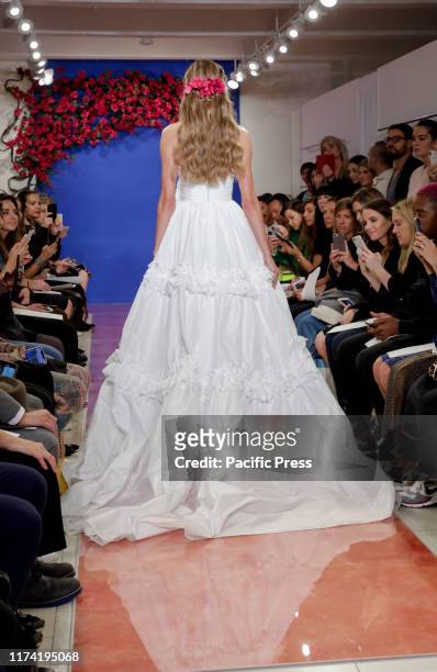 Model walks the runway at the Theia Fall 2020 collection during New York Bridal Week at the Theia Showroom, Manhattan.
