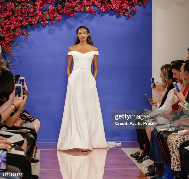 Model walks the runway at the Theia Fall 2020 collection during New York Bridal Week at the Theia Showroom, Manhattan.