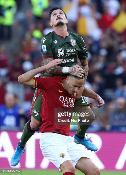 Nikola Kalinic of Roma and Fabio Pisacane of Cagliari during the Serie A match AS Roma v Cagliari Calcio at the Olimpico Stadium in Rome, Italy on...