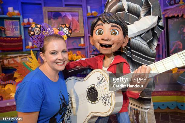 Actress Melissa Joan Hart meets Miguel of Disney and Pixar's film "Coco" at Disney California Adventure Park in Anaheim, Calif., Oct. 6, 2019. Miguel...
