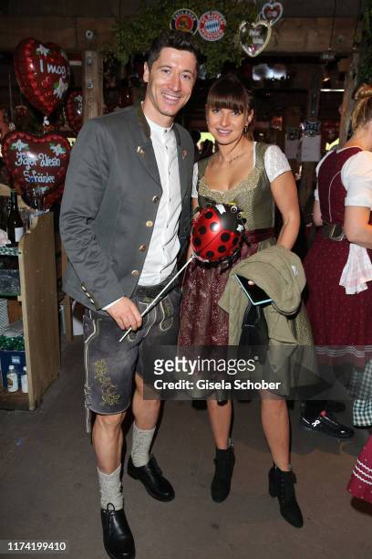 Robert Lewandowski soccer player FC Bayern Muenchen and his wife Anna Lewandowska during the annual "FC Bayern Wiesn" at Kaeferschaenke beer tent /...