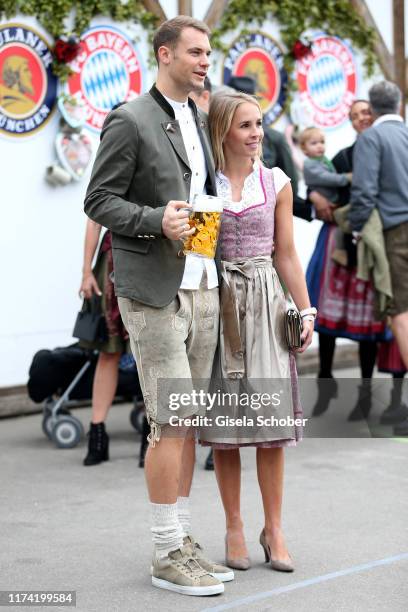 Goalkeeper Manuel Neuer of FC Bayern Muenchen and his wife Nina Weiss during the annual "FC Bayern Wiesn" at Kaeferschaenke beer tent / Oktoberfest...