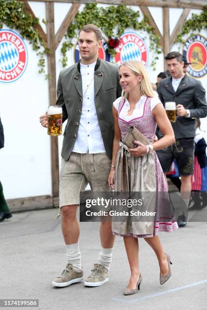 Goalkeeper Manuel Neuer of FC Bayern Muenchen and his wife Nina Weiss during the annual "FC Bayern Wiesn" at Kaeferschaenke beer tent / Oktoberfest...