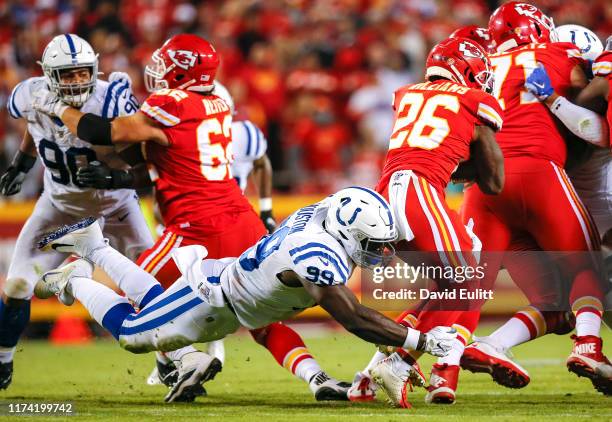 With 5:06 left in the game and fourth down and 1-yard to go, Justin Houston of the Indianapolis Colts tackles Damien Williams of the Kansas City...