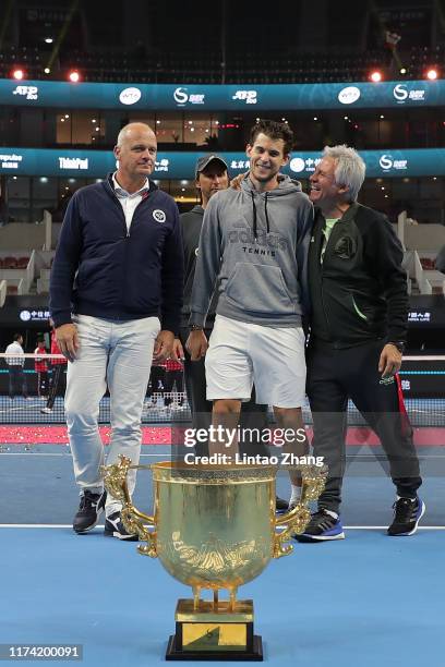 Dominic Thiem of Austria celebrate with team after win the Men's Singles final match against Stefanos Tsitsipas of Greece on Day nine of 2019 China...